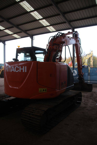 Hitachi ZX135US-5B - Lánctalpas kotró: 5 kép. Hitachi ZX135US-5B - Lánctalpas kotró: 5 kép.