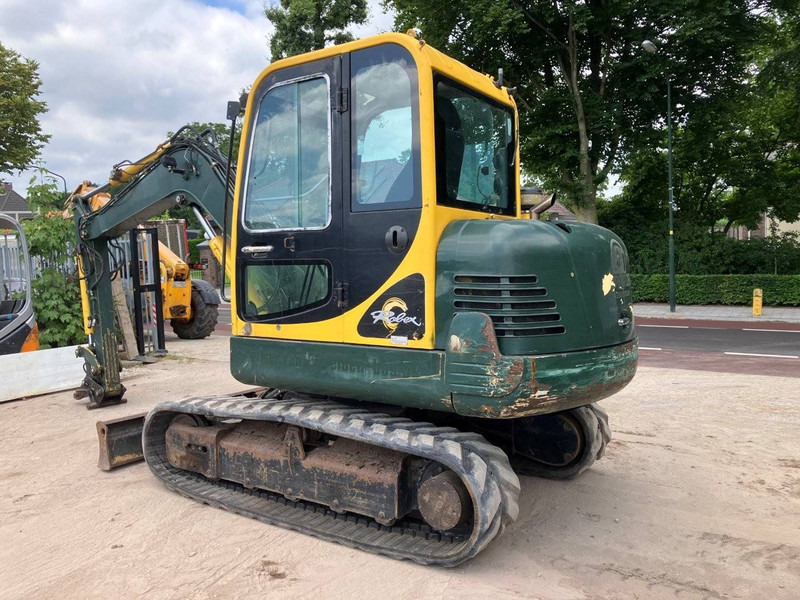 Hyundai Robex 55-7 - Lánctalpas kotró: 3 kép. Hyundai Robex 55-7 - Lánctalpas kotró: 3 kép.
