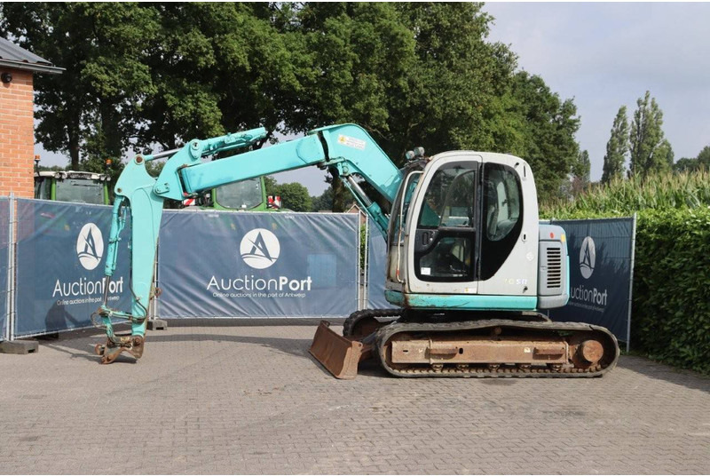 Kobelco SK70SR-1E - Lánctalpas kotró: 1 kép. Kobelco SK70SR-1E - Lánctalpas kotró: 1 kép.