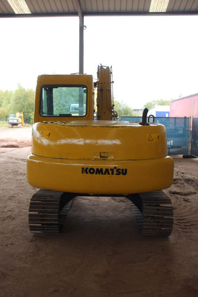 Komatsu PC60-7 - Lánctalpas kotró: 4 kép. Komatsu PC60-7 - Lánctalpas kotró: 4 kép.