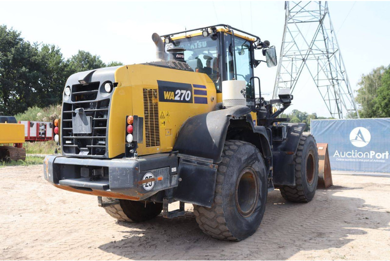 Gumikerekes homlokrakodó Komatsu WA270-8E0: 6 kép. Gumikerekes homlokrakodó Komatsu WA270-8E0: 6 kép.