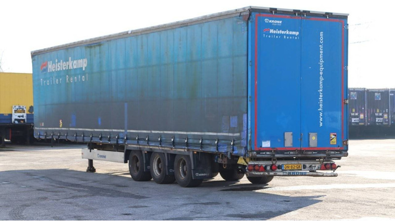 Krone SD - Ponyvás félpótkocsi: 4 kép. Krone SD - Ponyvás félpótkocsi: 4 kép.