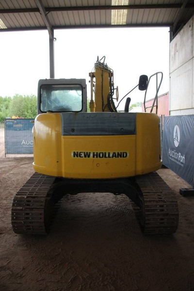 New Holland E115SR - Lánctalpas kotró: 4 kép. New Holland E115SR - Lánctalpas kotró: 4 kép.
