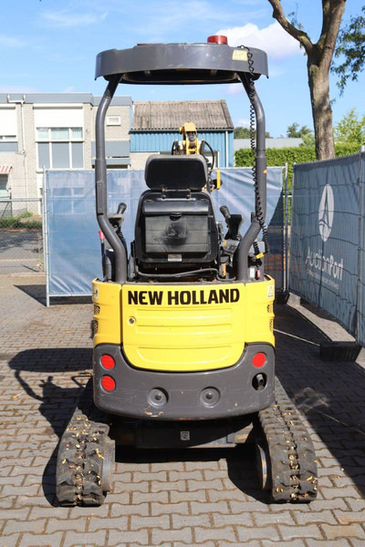 New Holland E17C - Minikotró: 5 kép. New Holland E17C - Minikotró: 5 kép.