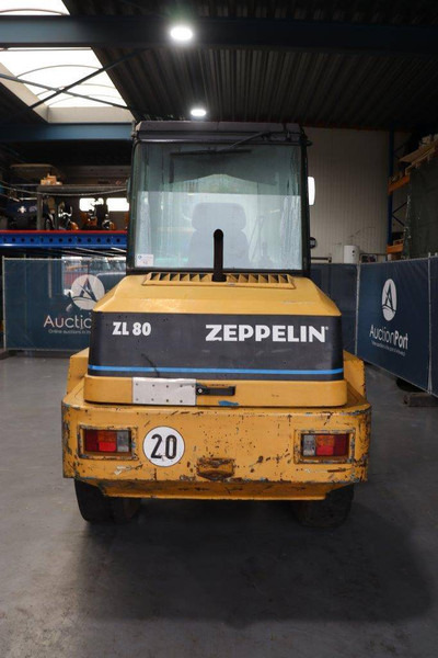 Schaeff ZL 80 - Gumikerekes homlokrakodó: 4 kép. Schaeff ZL 80 - Gumikerekes homlokrakodó: 4 kép.