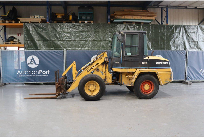 Schaeff ZL 80 - Gumikerekes homlokrakodó: 1 kép. Schaeff ZL 80 - Gumikerekes homlokrakodó: 1 kép.