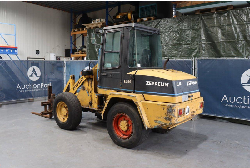 Schaeff ZL 80 - Gumikerekes homlokrakodó: 3 kép. Schaeff ZL 80 - Gumikerekes homlokrakodó: 3 kép.