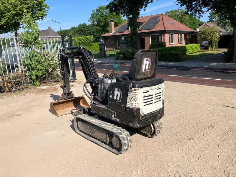 Takeuchi TB108 - Minikotró: 3 kép. Takeuchi TB108 - Minikotró: 3 kép.