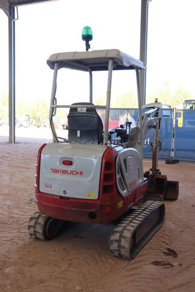 Takeuchi TB216 - Minikotró: 5 kép. Takeuchi TB216 - Minikotró: 5 kép.