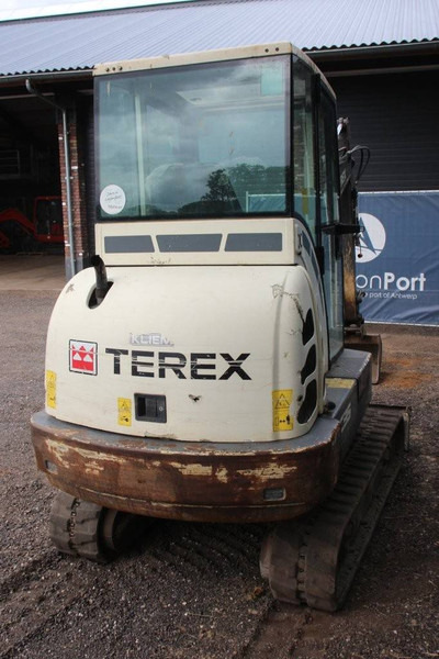 Terex TC35 - Lánctalpas kotró: 5 kép. Terex TC35 - Lánctalpas kotró: 5 kép.