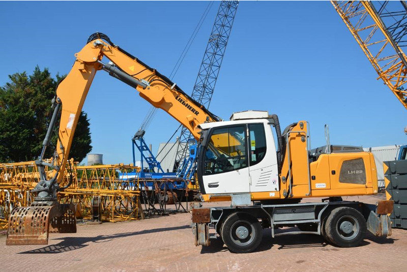 Liebherr LH 22 M - Hulladék kotró: 1 kép. Liebherr LH 22 M - Hulladék kotró: 1 kép.