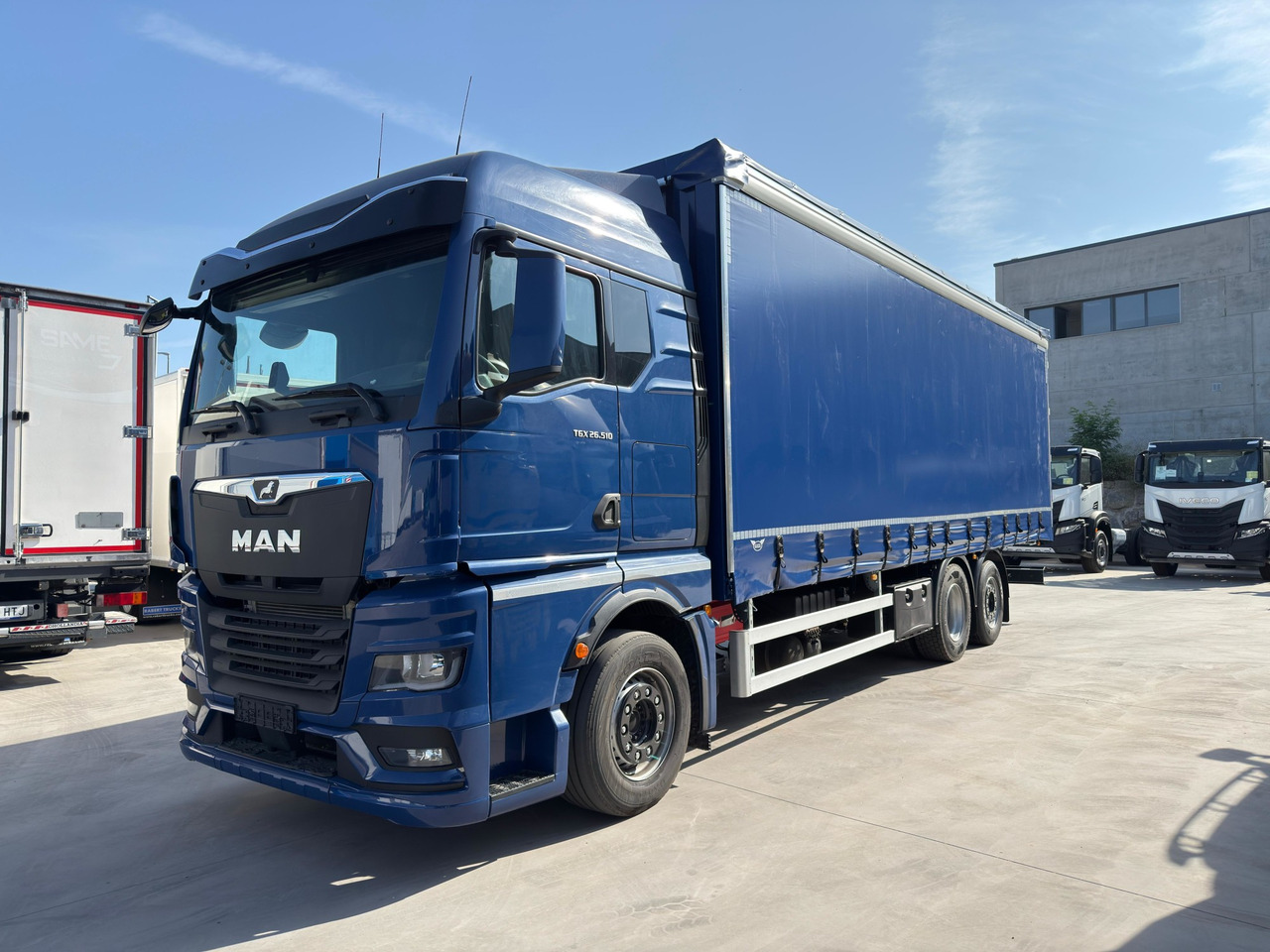 MAN 26.510 TGX E6 (Tauliner) - Ponyvás teherautó: 1 kép. MAN 26.510 TGX E6 (Tauliner) - Ponyvás teherautó: 1 kép.