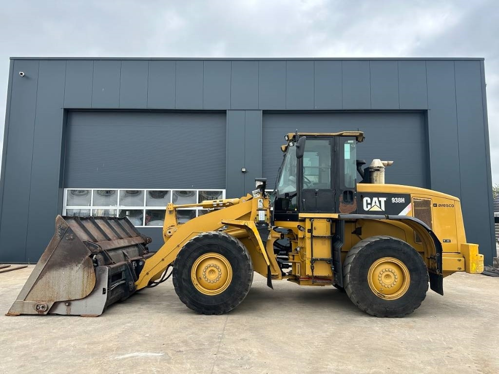 CAT 938 H - Gumikerekes homlokrakodó: 1 kép. CAT 938 H - Gumikerekes homlokrakodó: 1 kép.