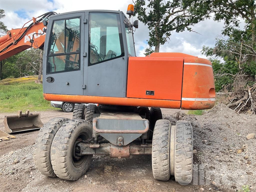 Atlas 1404 - Gumikerekes kotró: 5 kép. Atlas 1404 - Gumikerekes kotró: 5 kép.