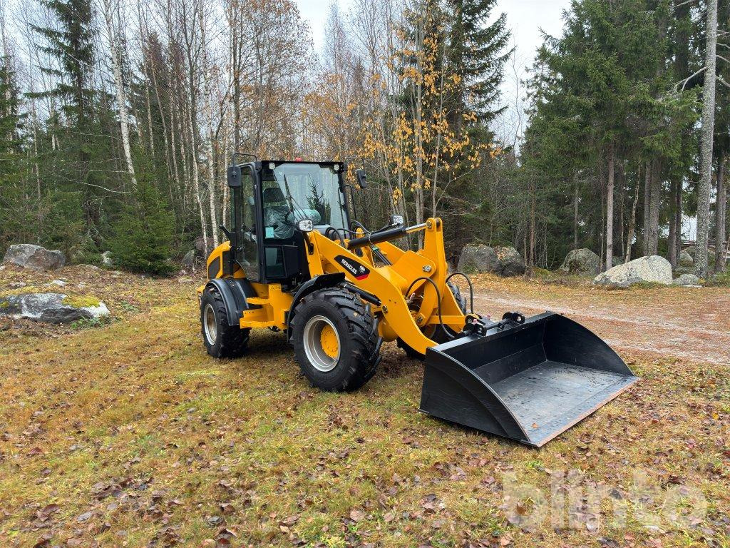 Heracles H580 - Gumikerekes homlokrakodó: 3 kép. Heracles H580 - Gumikerekes homlokrakodó: 3 kép.