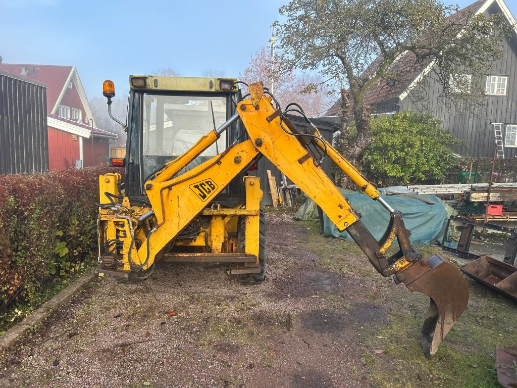 JCB 2 CX Streetmaster med tillbehör - Kotrórakodó: 4 kép. JCB 2 CX Streetmaster med tillbehör - Kotrórakodó: 4 kép.