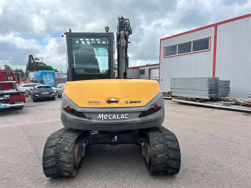 Mecalac 8MCR - Lánctalpas kotró: 4 kép. Mecalac 8MCR - Lánctalpas kotró: 4 kép.