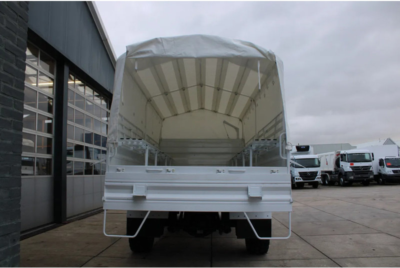 Mercedes-Benz Arocs 1836 A 4x4 Cargo Truck - Ponyvás teherautó: 4 kép. Mercedes-Benz Arocs 1836 A 4x4 Cargo Truck - Ponyvás teherautó: 4 kép.