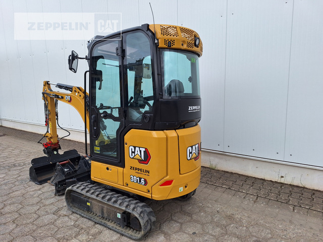 Cat 301.6-05A - Minikotró: 3 kép. Cat 301.6-05A - Minikotró: 3 kép.