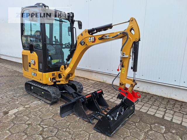 Cat 301.6-05A - Minikotró: 3 kép. Cat 301.6-05A - Minikotró: 3 kép.