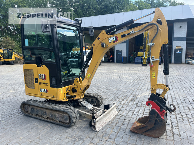 Cat 301.8-05A - Minikotró: 2 kép. Cat 301.8-05A - Minikotró: 2 kép.