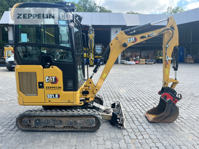 Cat 301.8-05A - Minikotró: 3 kép. Cat 301.8-05A - Minikotró: 3 kép.