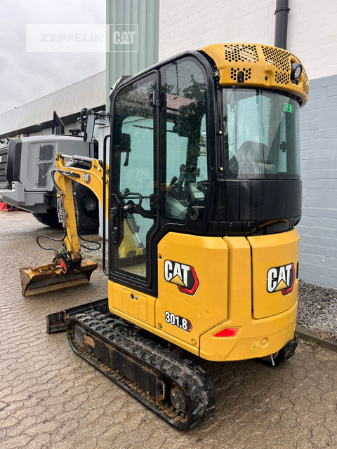 Cat 301.8-05A - Minikotró: 2 kép. Cat 301.8-05A - Minikotró: 2 kép.