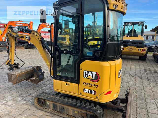 Cat 301.8-05A - Minikotró: 3 kép. Cat 301.8-05A - Minikotró: 3 kép.