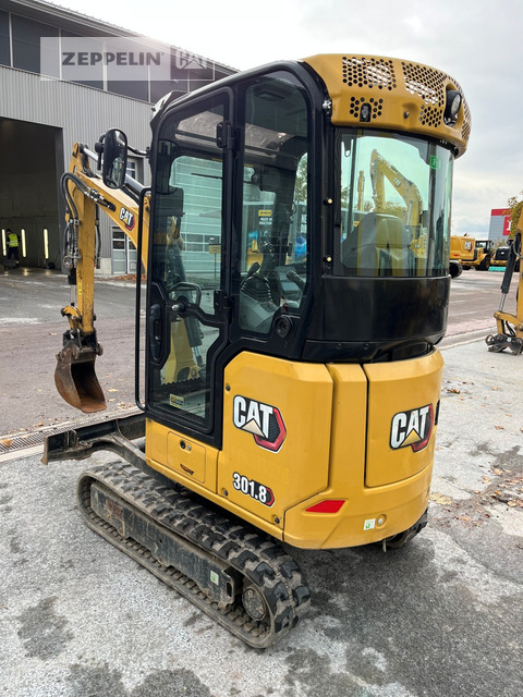 Cat 301.8-05A - Minikotró: 2 kép. Cat 301.8-05A - Minikotró: 2 kép.