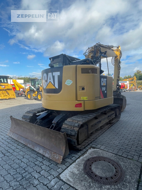Cat 315FL - Lánctalpas kotró: 3 kép. Cat 315FL - Lánctalpas kotró: 3 kép.