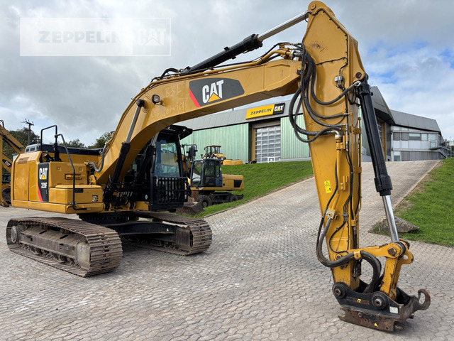 Cat 320FL - Lánctalpas kotró: 2 kép. Cat 320FL - Lánctalpas kotró: 2 kép.