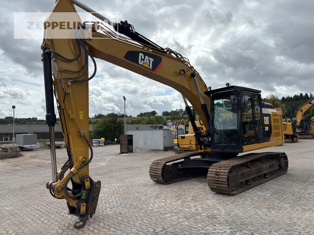 Cat 320FL - Lánctalpas kotró: 2 kép. Cat 320FL - Lánctalpas kotró: 2 kép.