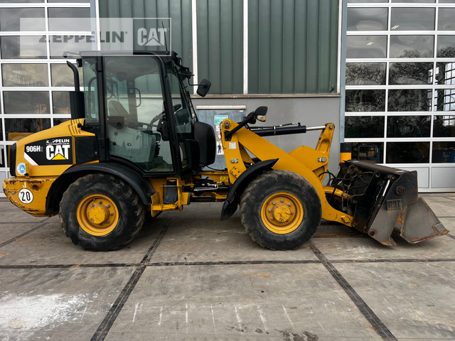 Cat 906H - Gumikerekes homlokrakodó: 5 kép. Cat 906H - Gumikerekes homlokrakodó: 5 kép.