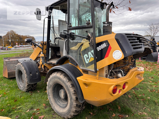 Cat 908H - Gumikerekes homlokrakodó: 3 kép. Cat 908H - Gumikerekes homlokrakodó: 3 kép.