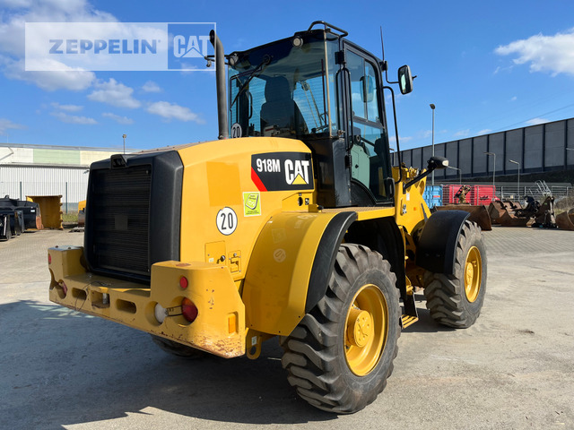 Cat 918M - Gumikerekes homlokrakodó: 5 kép. Cat 918M - Gumikerekes homlokrakodó: 5 kép.