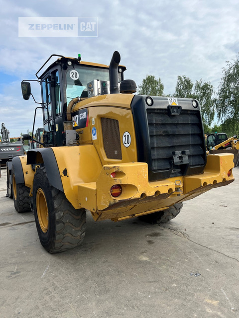 Cat 938M - Gumikerekes homlokrakodó: 4 kép. Cat 938M - Gumikerekes homlokrakodó: 4 kép.