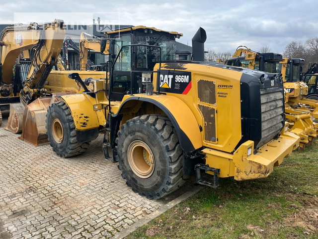 Cat 966MXE - Gumikerekes homlokrakodó: 4 kép. Cat 966MXE - Gumikerekes homlokrakodó: 4 kép.
