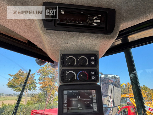 Gumikerekes homlokrakodó Cat 972MXE: 23 kép. Gumikerekes homlokrakodó Cat 972MXE: 23 kép.