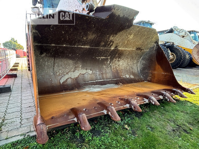 Gumikerekes homlokrakodó Cat 972MXE: 6 kép. Gumikerekes homlokrakodó Cat 972MXE: 6 kép.