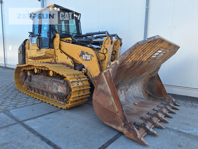 Cat 973K - Lánctalpas homlokrakodó: 4 kép. Cat 973K - Lánctalpas homlokrakodó: 4 kép.