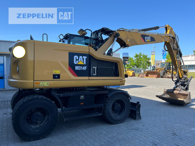 Cat M314F - Gumikerekes kotró: 4 kép. Cat M314F - Gumikerekes kotró: 4 kép.