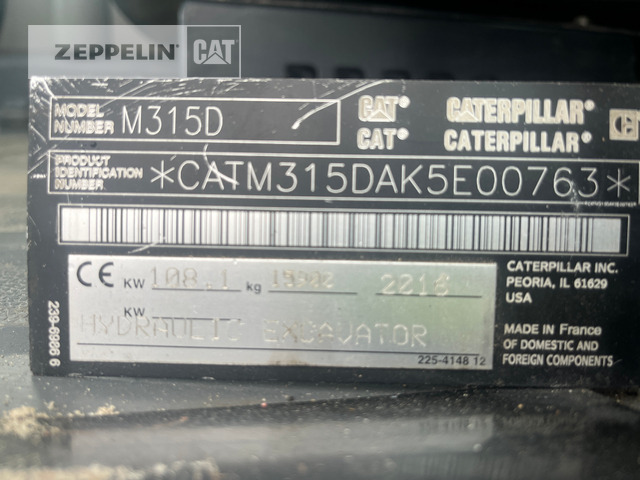 Cat M315D - Gumikerekes kotró: 2 kép. Cat M315D - Gumikerekes kotró: 2 kép.