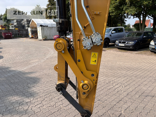 Cat M318-07A - Gumikerekes kotró: 5 kép. Cat M318-07A - Gumikerekes kotró: 5 kép.