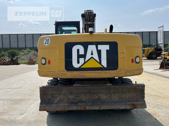 Cat M318D - Gumikerekes kotró: 5 kép. Cat M318D - Gumikerekes kotró: 5 kép.