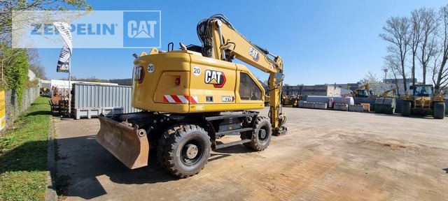 Cat M319-07A - Gumikerekes kotró: 1 kép. Cat M319-07A - Gumikerekes kotró: 1 kép.