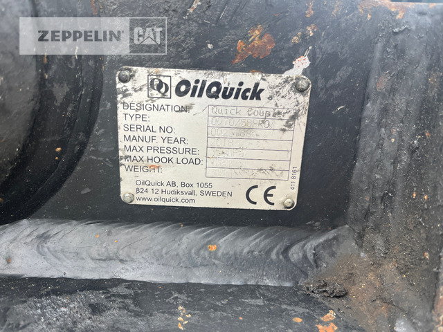Gumikerekes kotró Cat M320F: 12 kép.