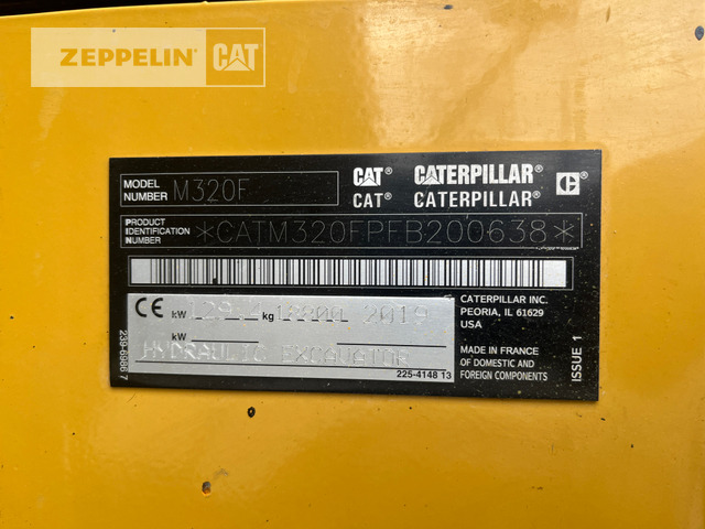 Gumikerekes kotró Cat M320F: 10 kép.