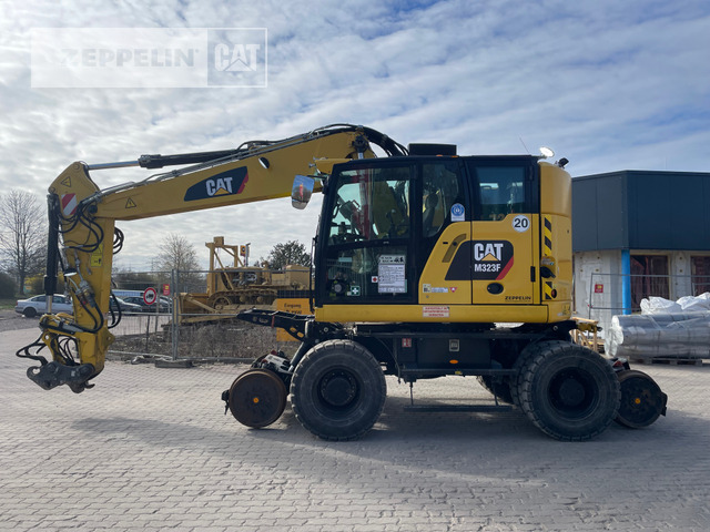 Cat M323F - Kotrógép: 2 kép. Cat M323F - Kotrógép: 2 kép.