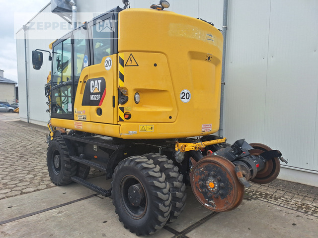 Cat M323F - Kotrógép: 2 kép. Cat M323F - Kotrógép: 2 kép.