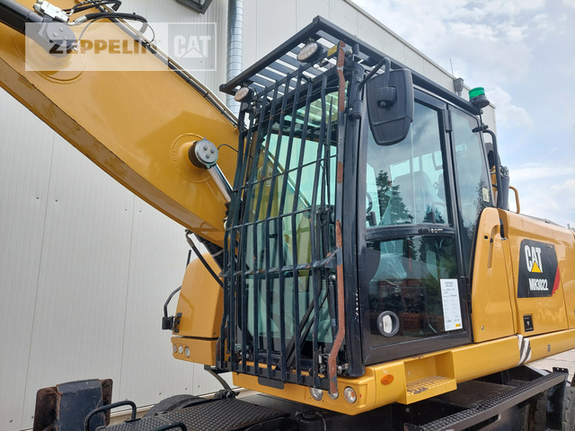 Hulladék kotró Cat MH3022-06C: 7 kép.